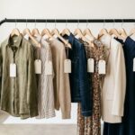"fashion clothing brand names hanging on boutique rack"
